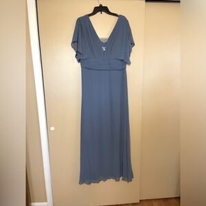 Never worn. Perfect for MOB dress. Very flattering